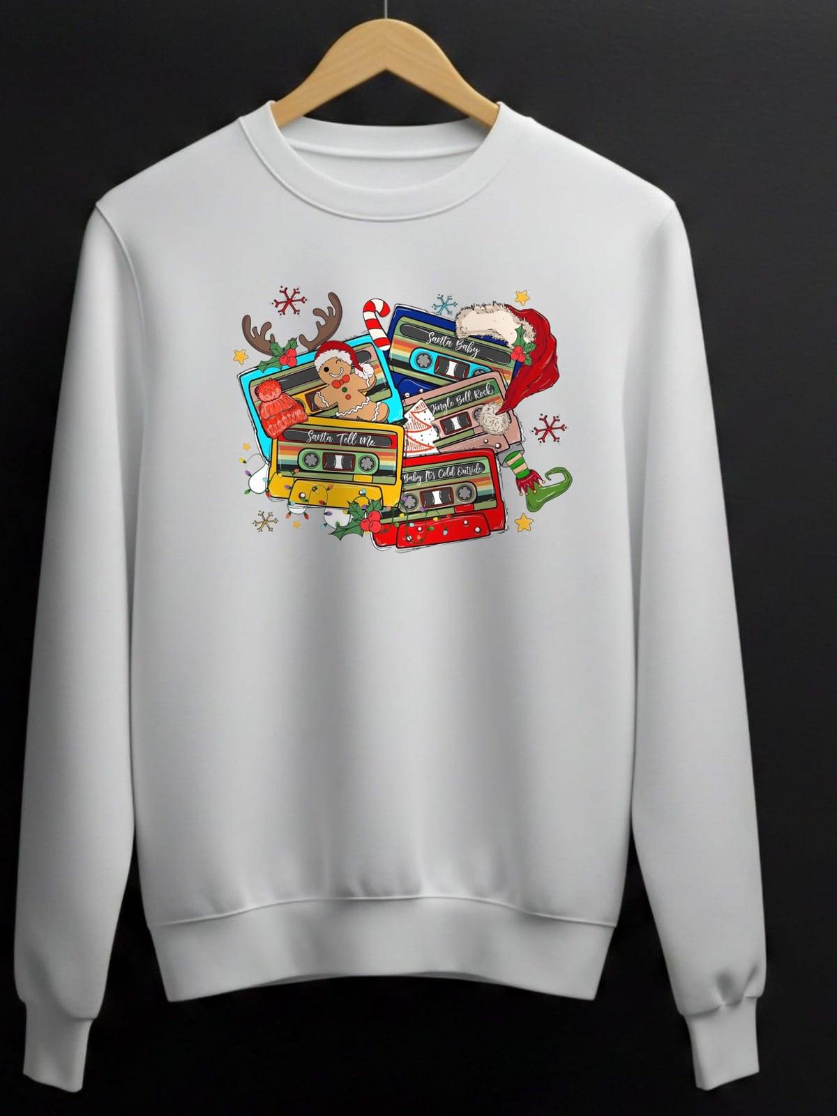 White sweatshirt with a pile of colorful Christmas cassette tapes